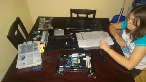 Fixing a laptop with my daughter
